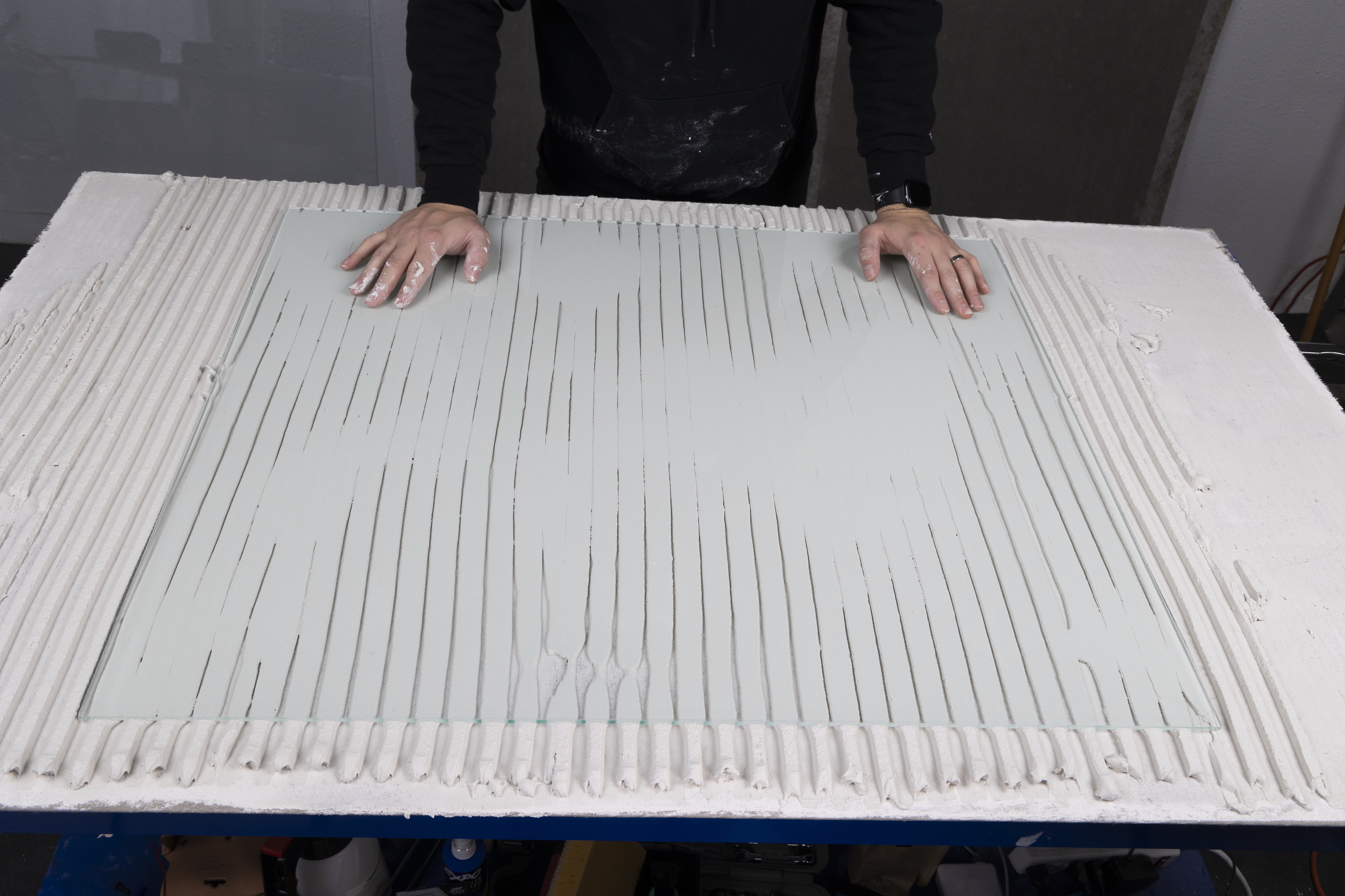 lower coverage rate with a traditional square notched trowel